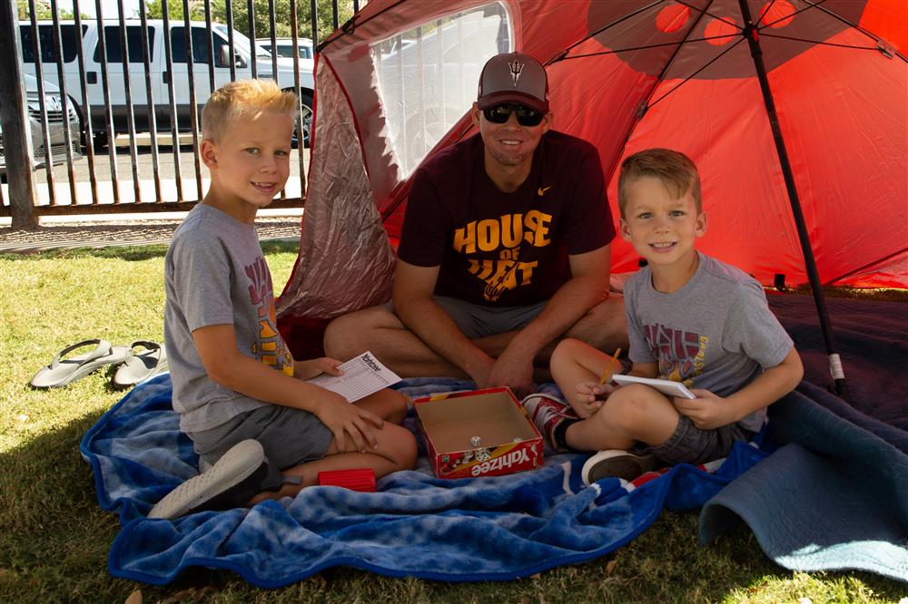 Families visit students during lunch and play games.